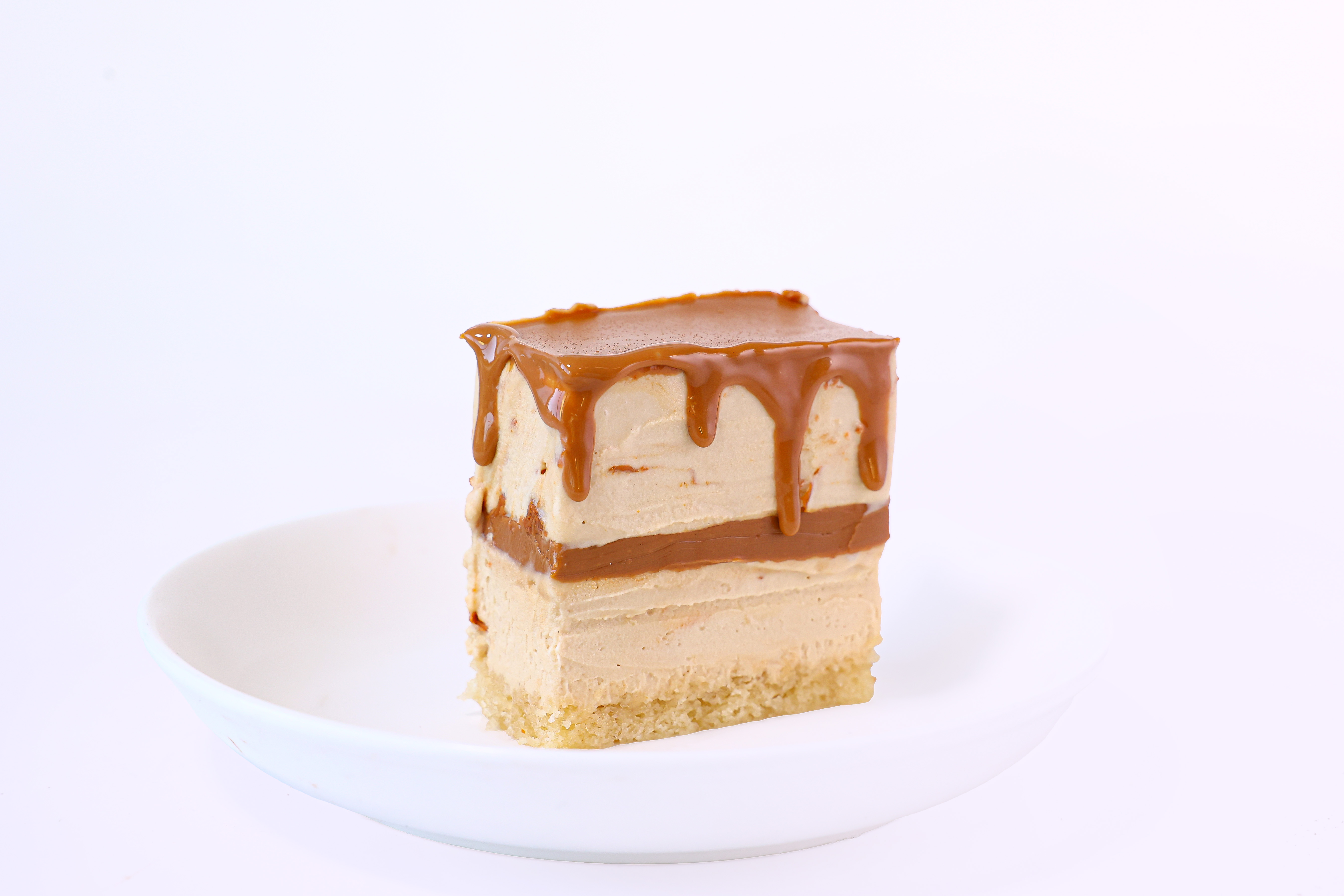 Matcha cake with white chocolate drizzle